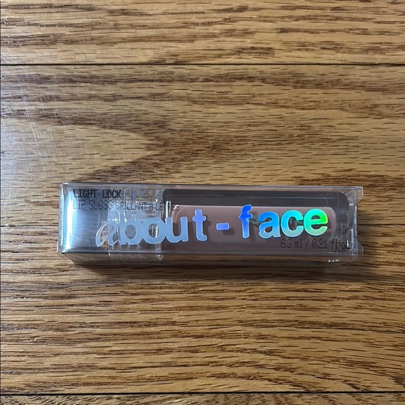 About-Face Light Lock Lip Gloss- Shade Plastic Petal - Picture 1 of 1